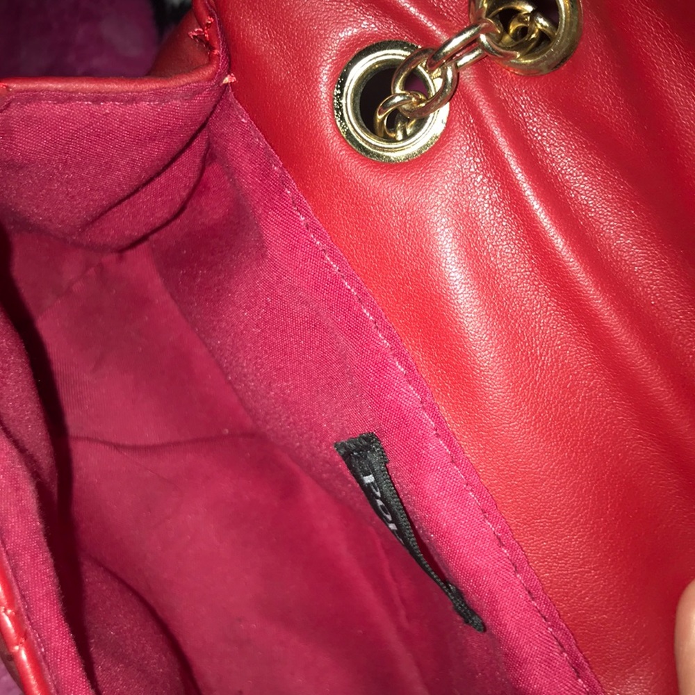 Red Popatu purse with gold chain